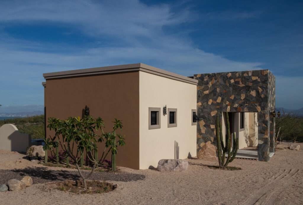 La Paz Bellavista Beautiful and cozy two-story house with a contemporary design in Bellavista Plus, La Paz. Built on a 122.5 m² lot with 181.5 m² of construction. Excellent location near shopping centers, banks, hospitals, schools, restaurants, and main roads. Features on the ground floor: open-concept living-dining area, beautiful kitchen, two bedrooms (one master), two full bathrooms, patio with pool and palapa, and service area. Upstairs: spacious master bedroom with large walk-in closet and private bath, plus an extra room ideal as an office or bedroom. Includes pool with pump room, covered garage with electric gate, water pressure system, cistern, and minisplits. Recently painted and waterproofed--ready to move in! – Bahía Azul, La Paz, BS