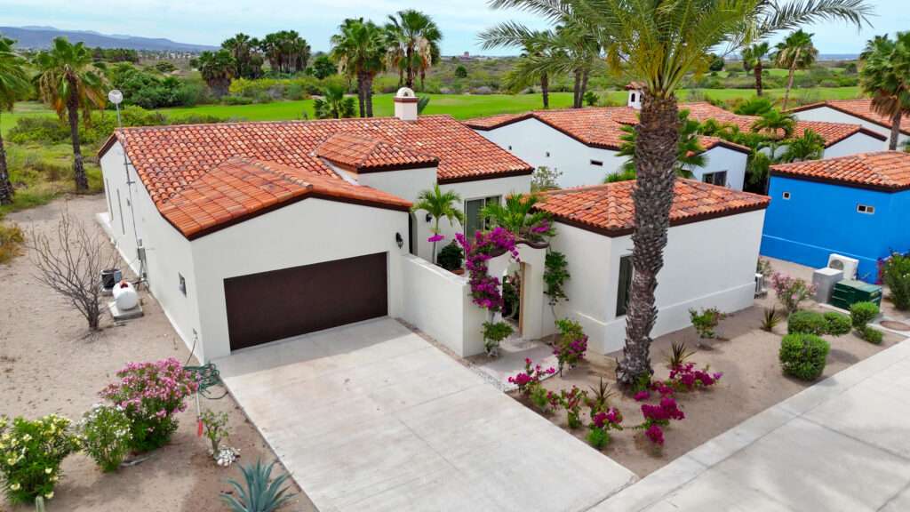 La Paz Paraiso Del Mar Beautiful home for sale in the exclusive community of Paraíso del Mar. This sought-after Luna model features three bedrooms and three full bathrooms, including a detached guest casita--perfect for hosting family and friends with added privacy.The home welcomes you through a charming courtyard filled with vibrant flowers and bougainvillea, highlighted by an elegant arched entry. As you step inside, an iron gate opens into a bright, open-concept living and kitchen area designed for comfort and entertaining.Sliding glass doors lead to the back patio, where you can enjoy serene – 1 Torote, La Paz, BS