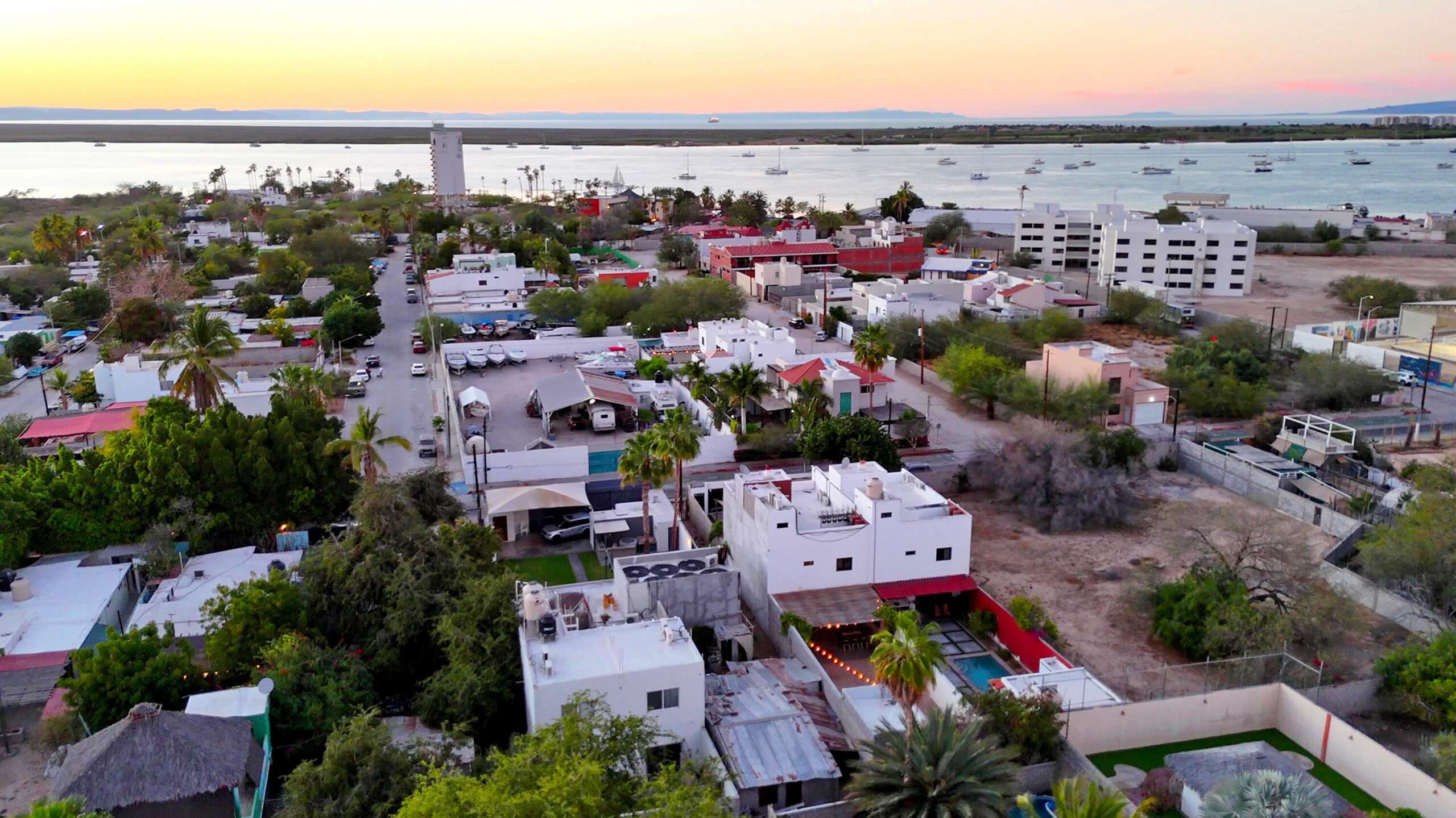 La Paz Centro Prime Investment Opportunity Near the Malecón - El Manglito, La PazDiscover an exceptional opportunity to own a beautiful home in one of La Paz's most desirable neighborhoods--El Manglito. Ideally located just steps from the iconic Malecón and with direct access to the bike path, this property offers the perfect blend of lifestyle, convenience, and value.This spacious two-story home features generous living areas and incredible potential for customization:Ground Floor:Bright and open living and dining area, with the option to convert part of the space into a third bedroom. Functional layout ideal for entertaining or family living.Upper Floor:Two comfortable bedrooms with ample natural light.Outdoor Space:Enjoy a private backyard designed for relaxation and (click mo and entertaining, complete with a BBQ area, pergola, and a cantina-style bar--perfect for gatherings.Parking:Secure parking for up to four vehicles, featuring an electric gate for added convenience.Located in a high-demand area close to the waterfront, restaurants, and city amenities, this home is ideal as a primary residence, vacation home, or investment property.Don't miss your chance to own in this prime location near the Malecón in La Paz!Oportunidad de Inversión en Ubicación Privilegiada Cerca del Malecón - El Manglito, La PazOutdoor Bodega in the back patio.Water storage cistern 5,000 lts.It has some ocean – 3290 C. Rangel, La Paz, BS