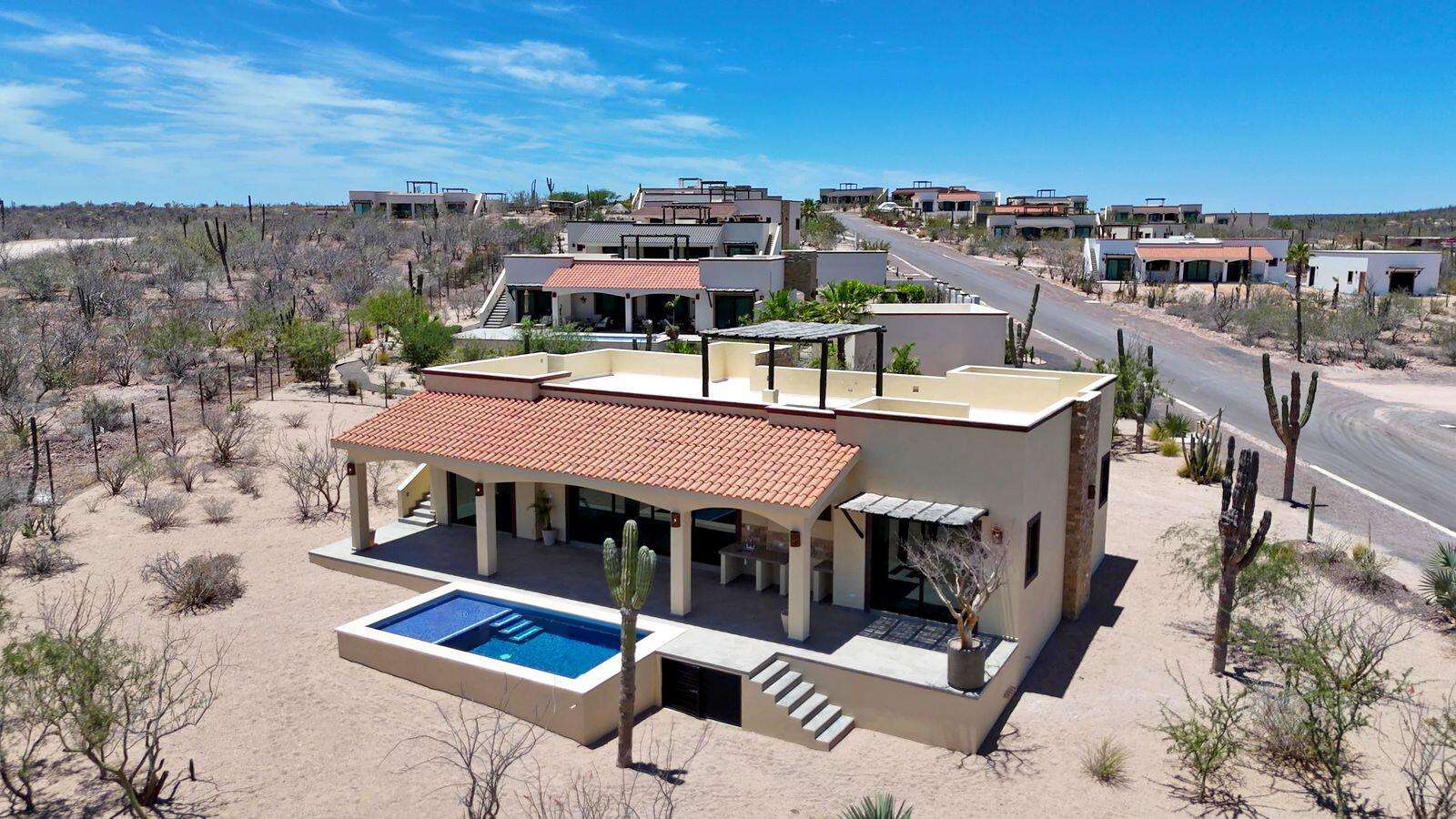 La Paz Villas Del Centenario Casa Alba is a thoughtfully designed 3BR/2BA residence with hacienda-style architecture, offering 151 m² / 1,628 sq ft of interior living space plus a 59 m² / 632 sq ft covered terrace, ideal for indoor-outdoor living. The home also features a rooftop terrace with a 25 m² / 269 sq ft palo de arco pergola and ocean – 7027 sn, La Paz, BCS, La Paz, BS
