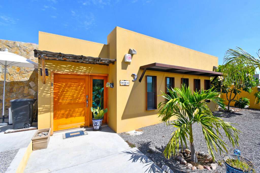 La Paz Lomas Del Centenario, Palo Verde Imagine beginning each morning watching the sun rise over the Bay of La Paz, and ending each evening with the twinkling lights of the city stretching across the water. Set high in the peaceful hills of El Centenario, this exceptional 3-bedroom, 3-bathroom residence was designed to embrace the natural beauty of Baja while offering complete privacy and effortless indoor-outdoor living.Occupying a generous double lot and backing onto a natural arroyo, the property enjoys an extraordinary sense of space and tranquility. Elegant privacy walls provide seclusion without sacrificing the spectacular desert, mountain, and ocean – 574 Calle 12, La Paz, BS
