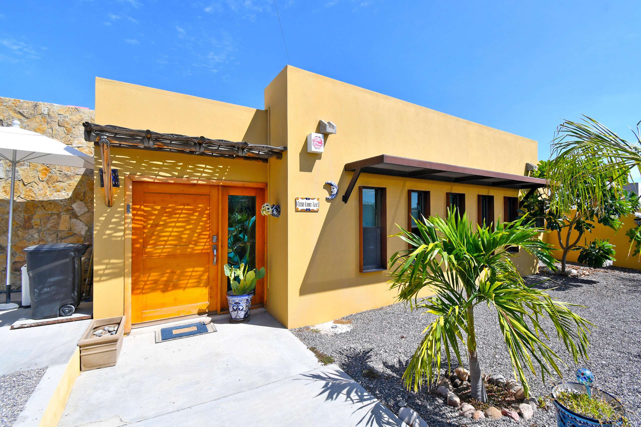 La Paz Lomas Del Centenario, Palo Verde Imagine beginning each morning watching the sun rise over the Bay of La Paz, and ending each evening with the twinkling lights of the city stretching across the water. Set high in the peaceful hills of El Centenario, this exceptional 3-bedroom, 3-bathroom residence was designed to embrace the natural beauty of Baja while offering complete privacy and effortless indoor-outdoor living.Occupying a generous double lot and backing onto a natural arroyo, the property enjoys an extraordinary sense of space and tranquility. Elegant privacy walls provide seclusion without sacrificing the spectacular desert, mountain, and ocean – 574 Calle 12, La Paz, BS