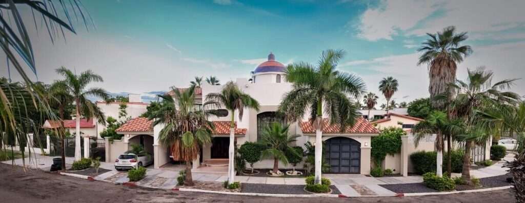 La Paz Marina Sol Italian-Style Home on Fidepaz's Main StreetLocated in one of La Paz's most prestigious and secure neighborhoods, this residence blends classic elegance with spacious and functional living areas. Its façade on Fidepaz's main street gives it a strong presence and easy access to all nearby services. Upon entering, you're welcomed by a carved wooden door that sets the tone for the home's unique character. It opens into a grand living room with soaring ceilings and a central dome, framed by a wide colonial-style staircase leading to the upper floor.The layout is ideal for family living: one bedroom on the ground floor, perfect for guests or those who prefer to avoid stairs, and two bedrooms upstairs, including the primary suite with an internal balcony overlooking the living room, adding a sense of openness and elegance.The spacious colonial-style kitchen is truly the heart of the homeperfect for family gatherings and entertaining guests. There's also a game room, ideal as a recreation or multipurpose space.Outside, the property Three covered parking spaces, one with a gate, offering both comfort and security.Note: Use of the shared pool requires covering the corresponding payment for its construction, as well as the maintenance fee established by the community. – De Las Ballenas, La Paz, BS